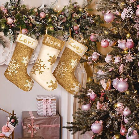 Doll stockings on fireplace.