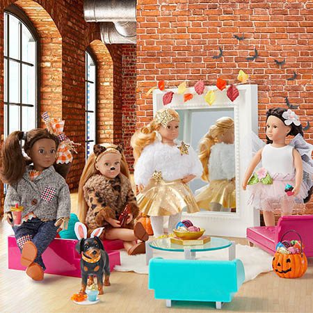 Dolls dressed up for Halloween.