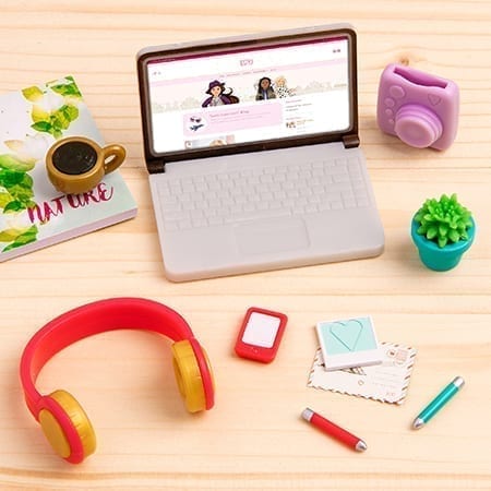 Doll laptop, headphones, camera, letter and pens.