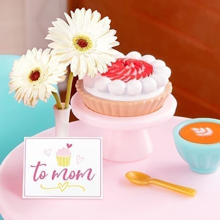 Toy cake and coffee with card.