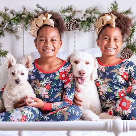 Two girls with dogs.