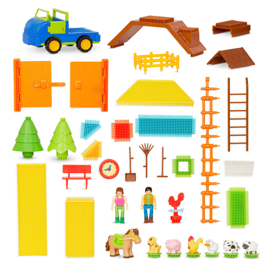 A 67-piece building block set with a farm theme, the set is laid out to show all the pieces, including animals, trees, and tractor.