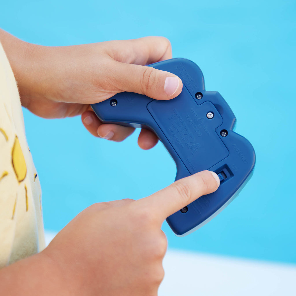 Underside of remote control shark toy