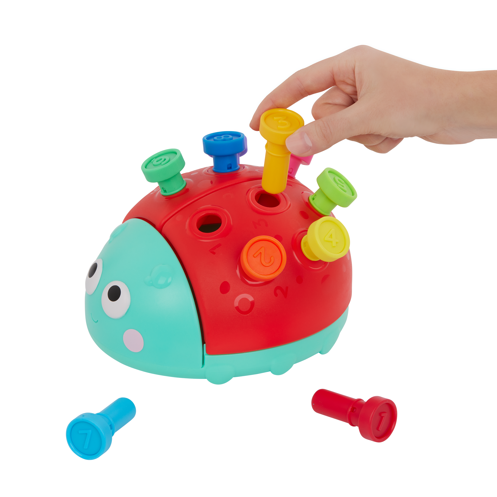 Colorful ladybug peg toy with booklet.
