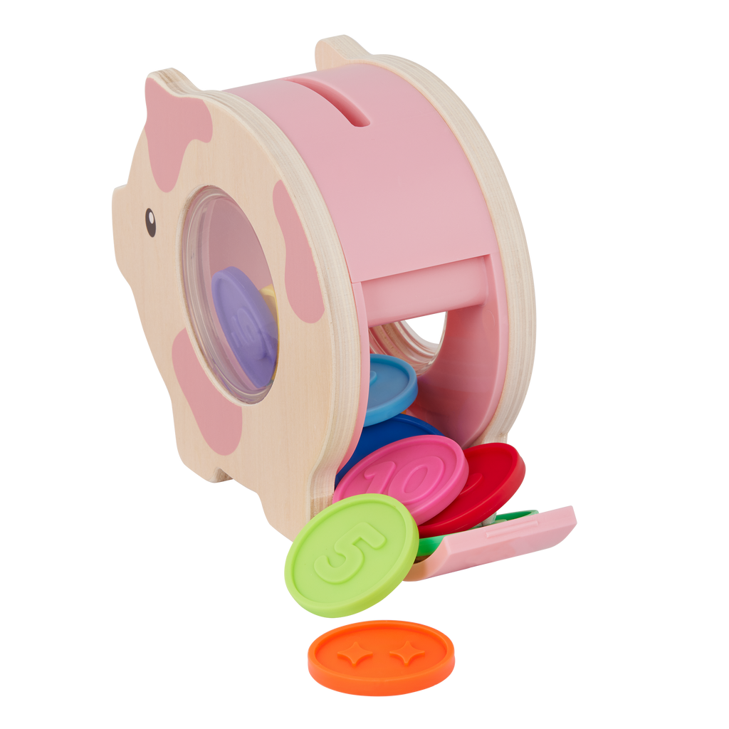 Piggy bank toy with colorful play coins and booklet.