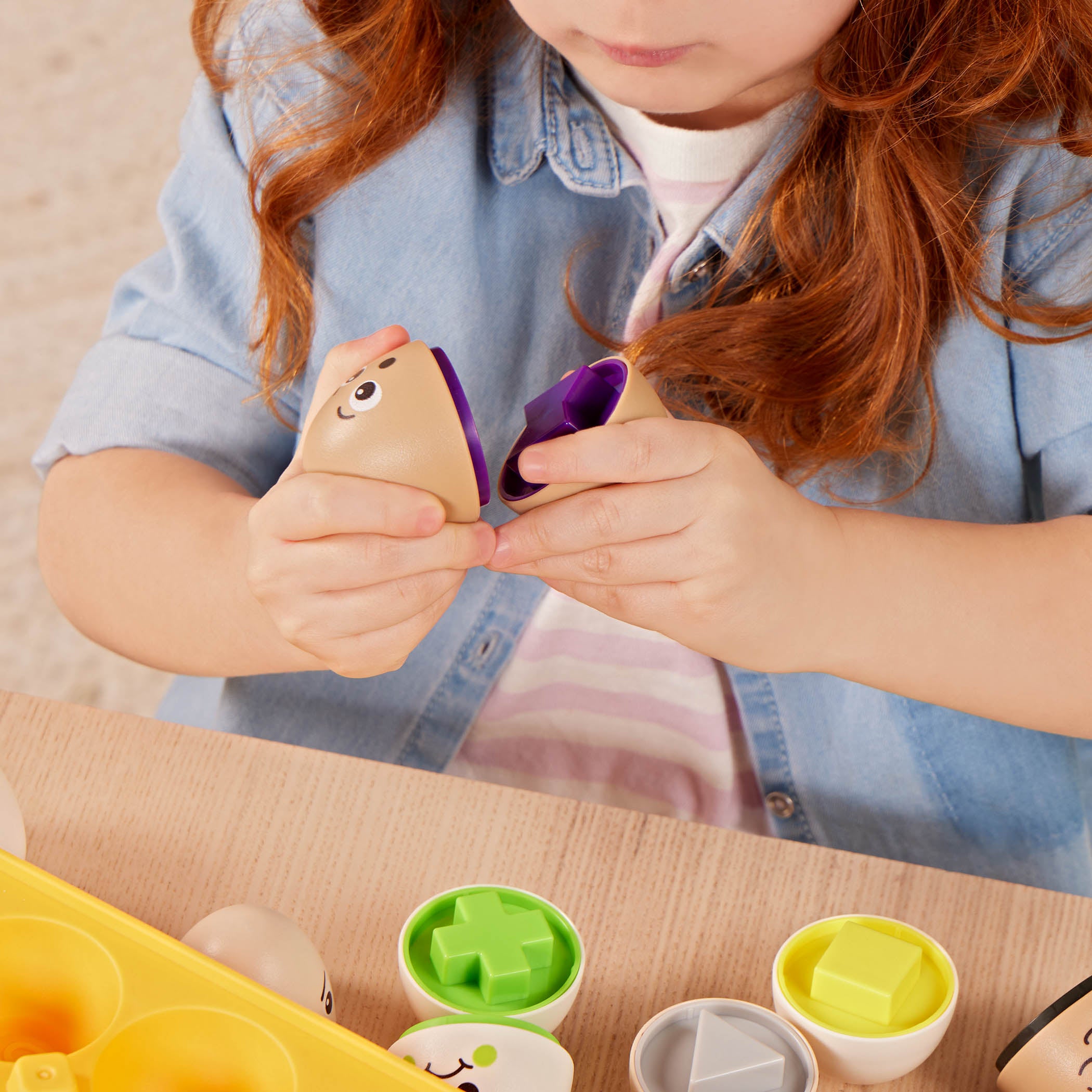 Egg bus playset with cards and a booklet.