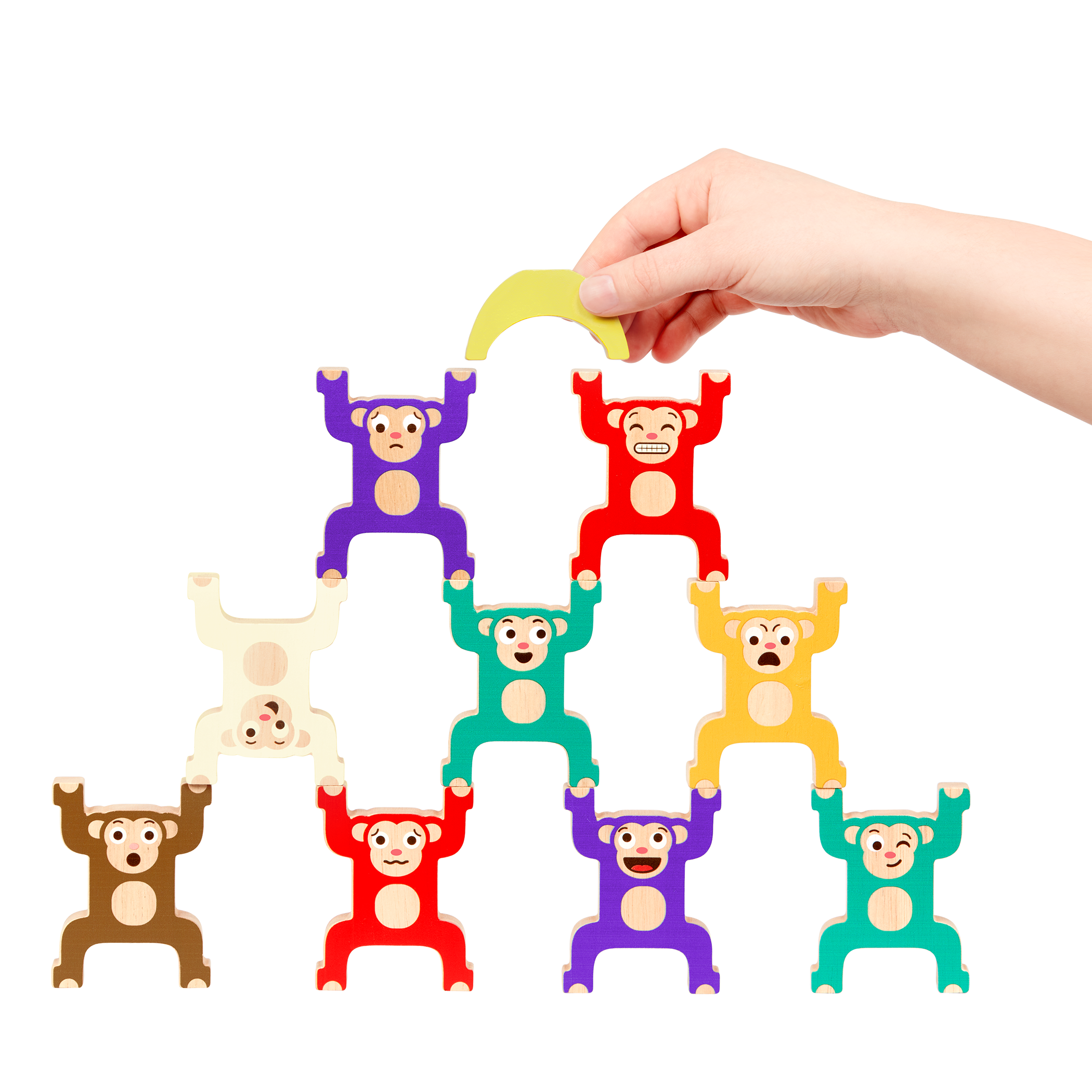 Colorful stacked monkey and fruit toys with a booklet.
