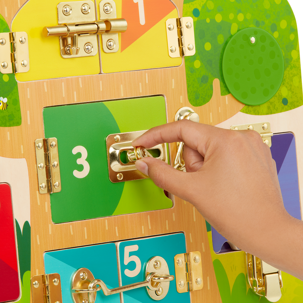 Booklet and board with animal illustrations and doors with locks and latches.