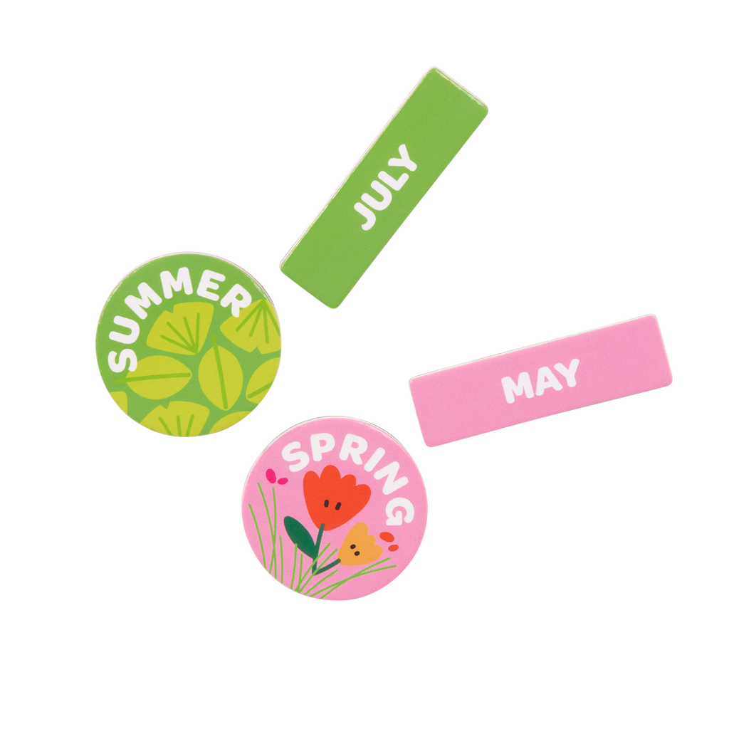 Calendar for kids with magnets, booklet, and dry-erase marker.