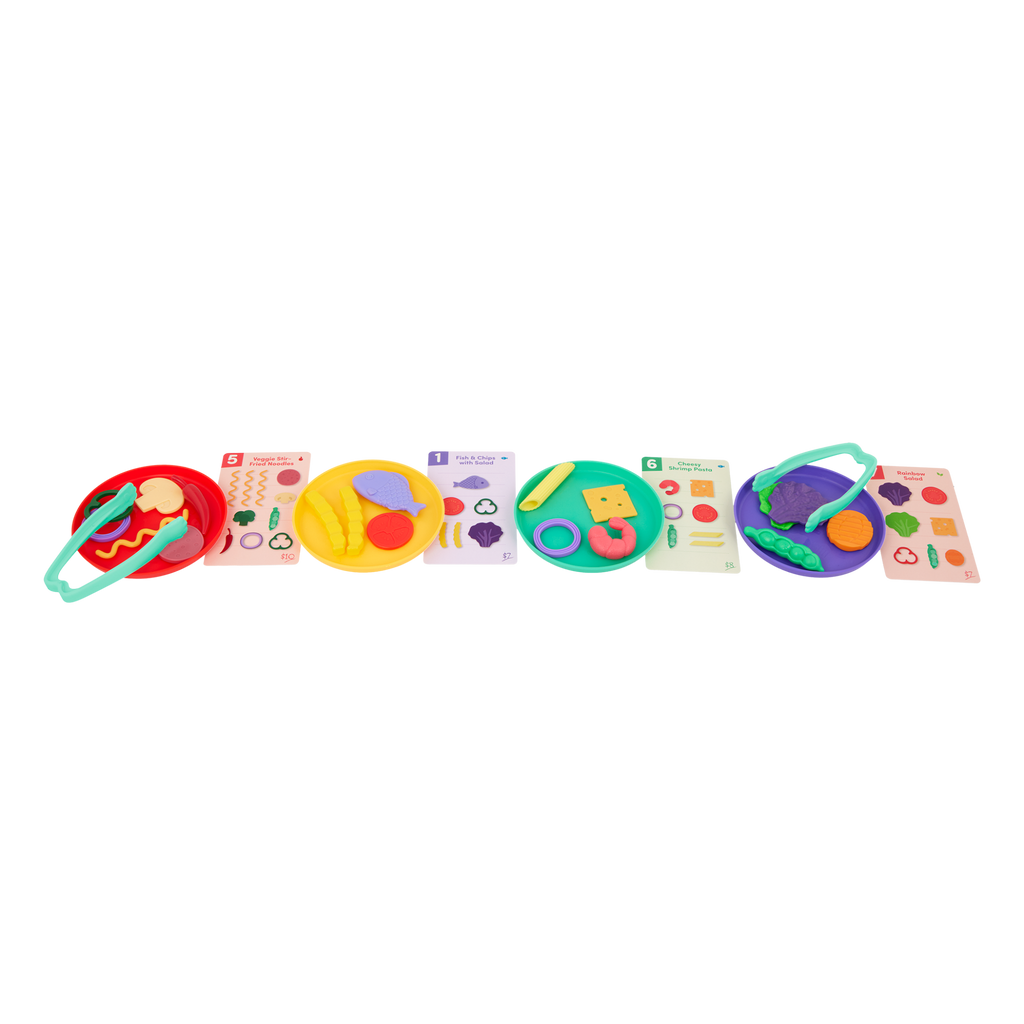 Colorful food sorting game with tongs, play food, activity cards, bowls, and a menu.