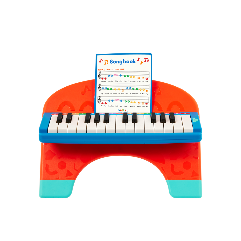 Toy piano and songsheet