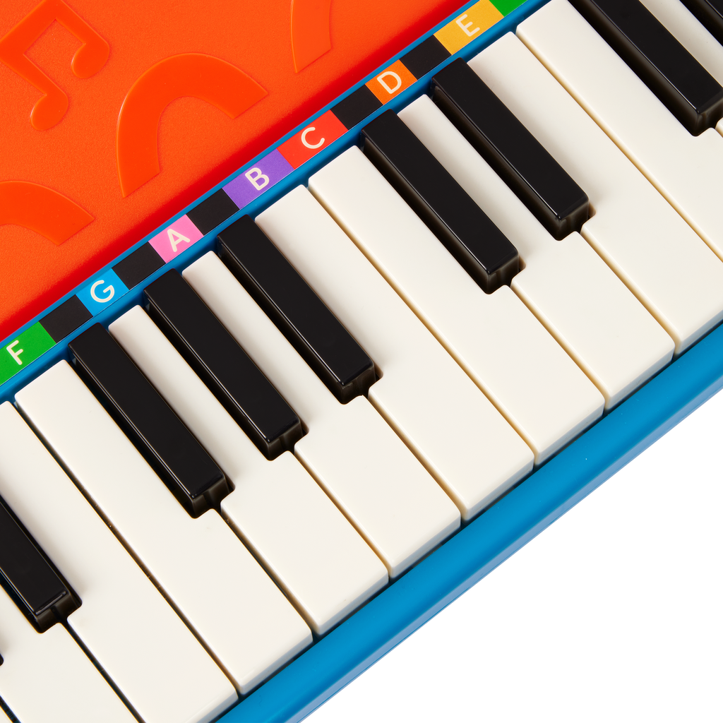 Toy piano and songsheet