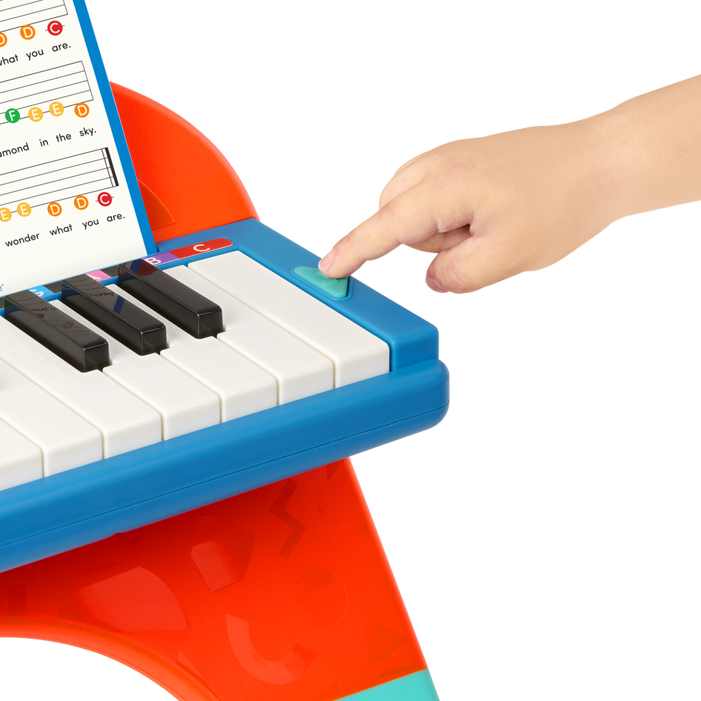 Toy piano and songsheet