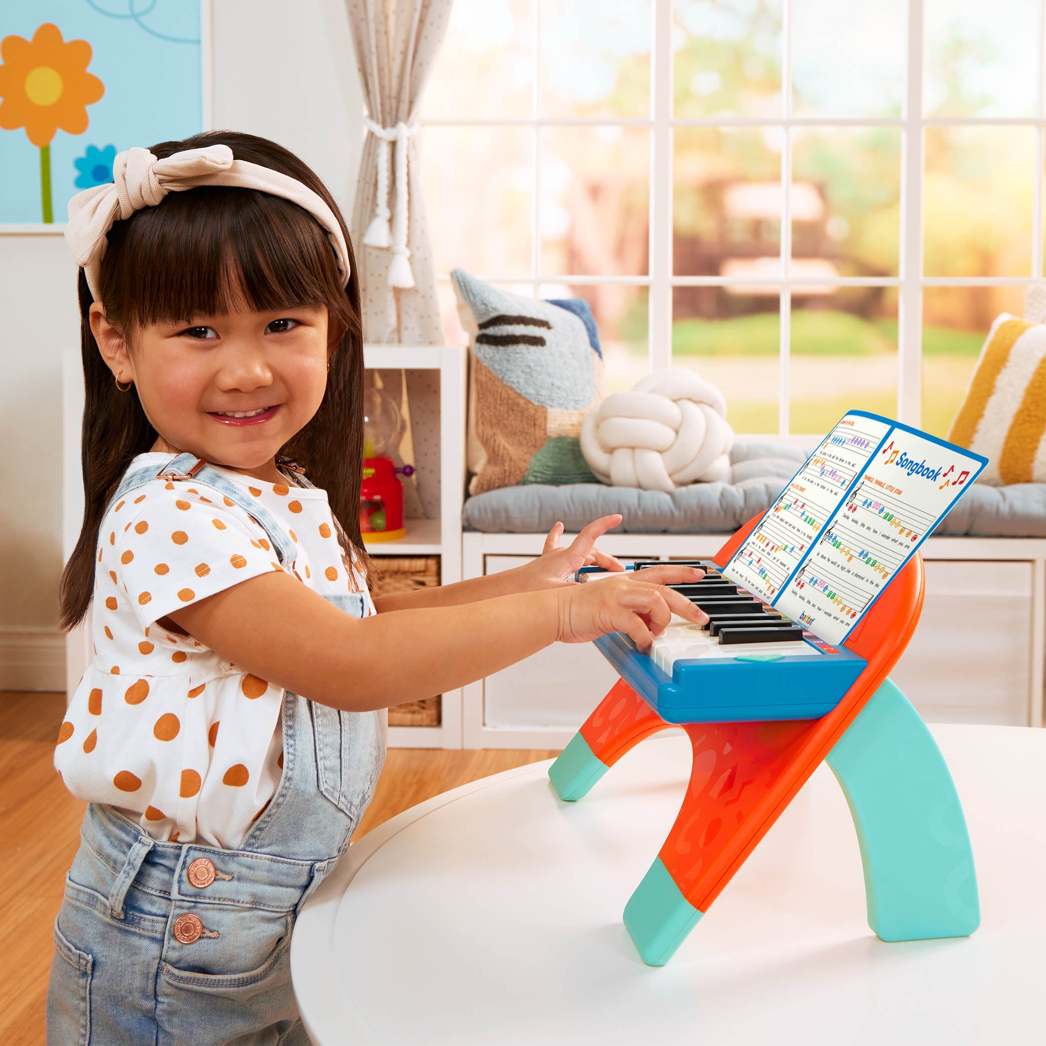 Toy piano and songsheet