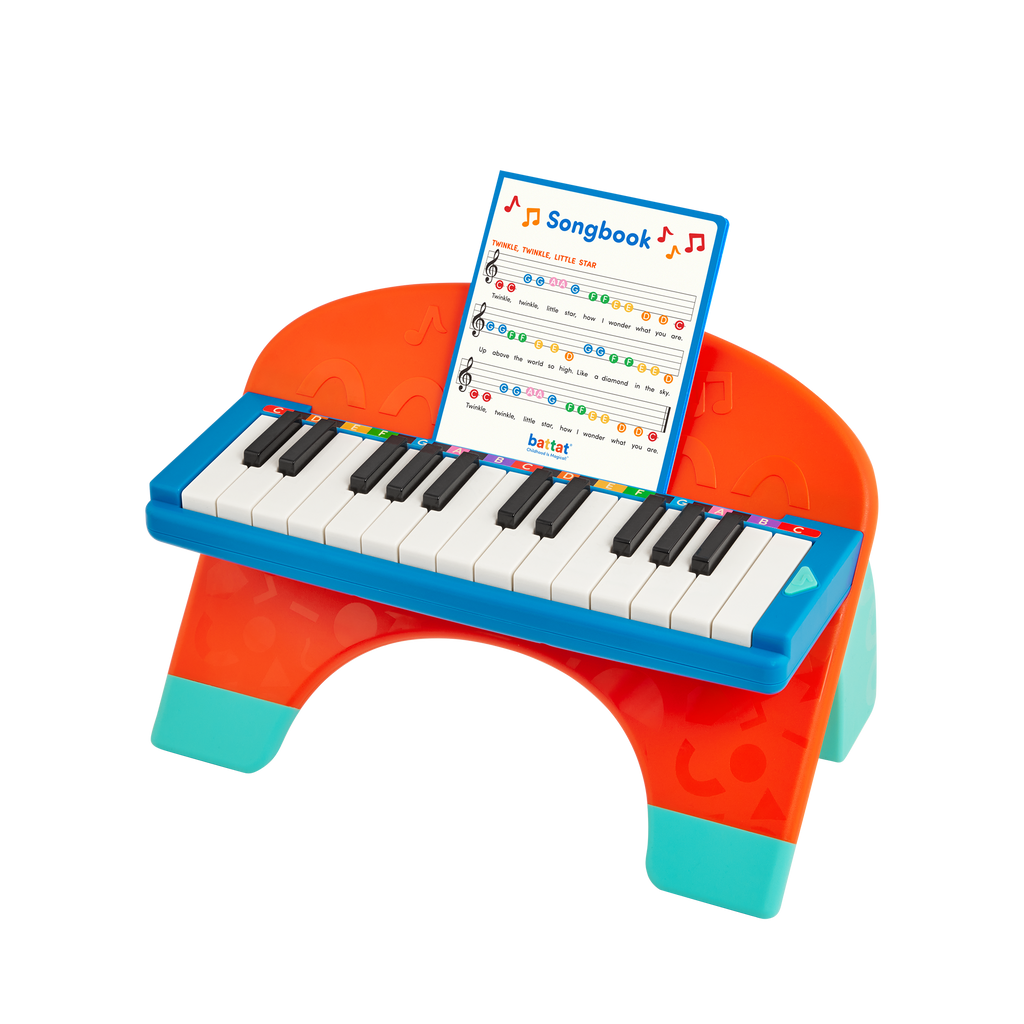Toy piano and songsheet
