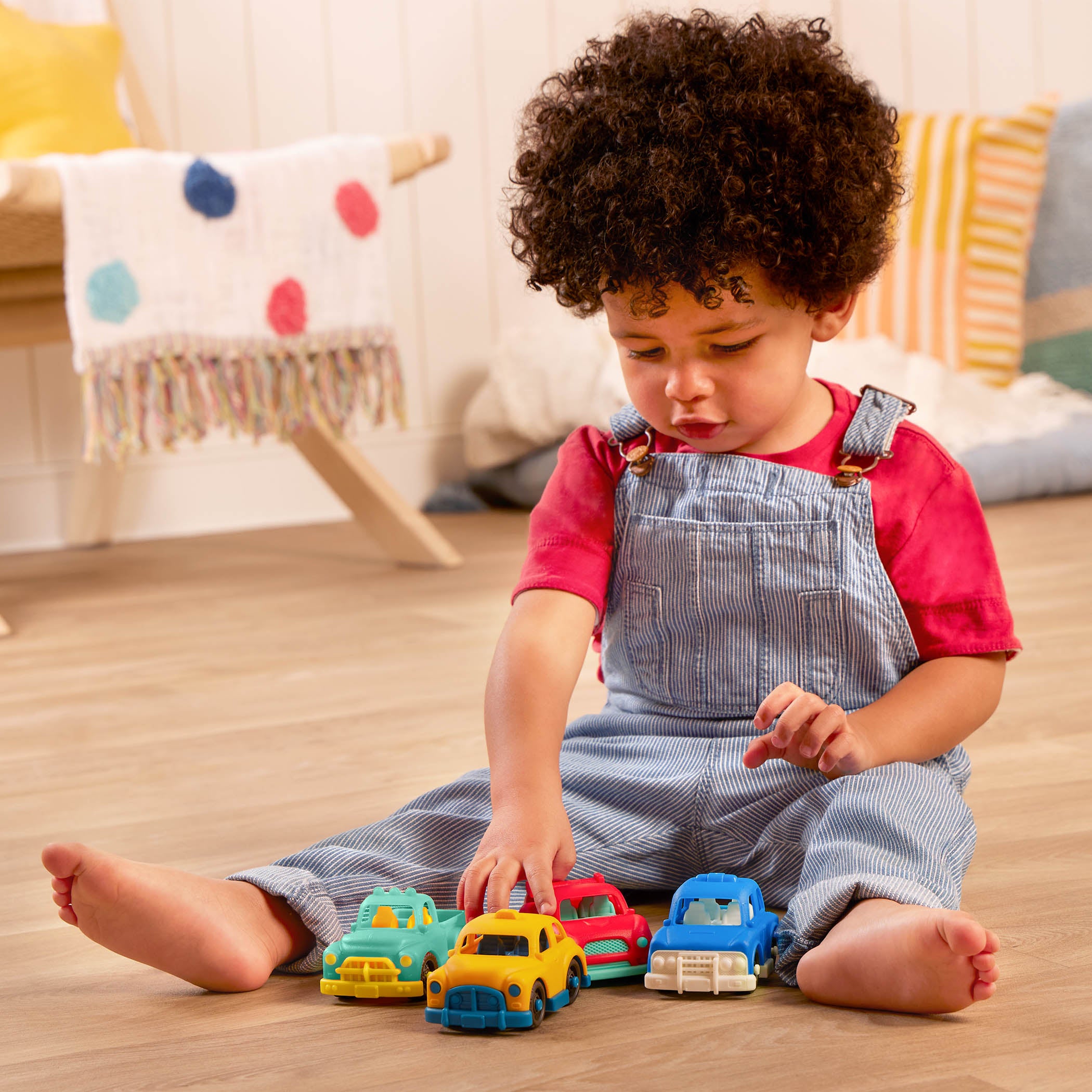 Plastic taxi, pick-up truck, police car, and sports car