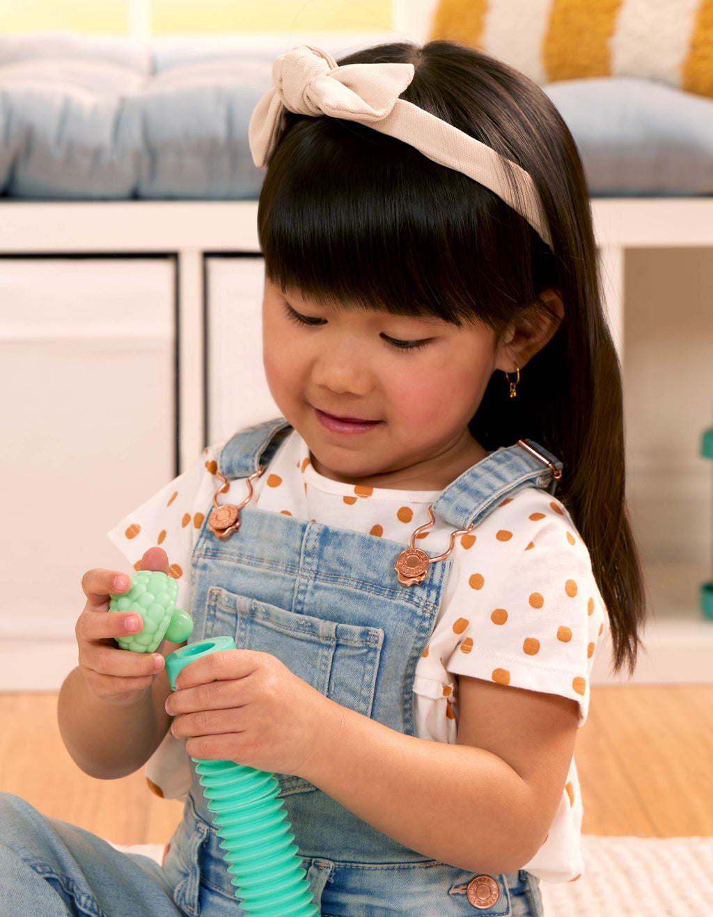 Stretchy toy animals including a horse, a cow, a sheep, a dog and a pig