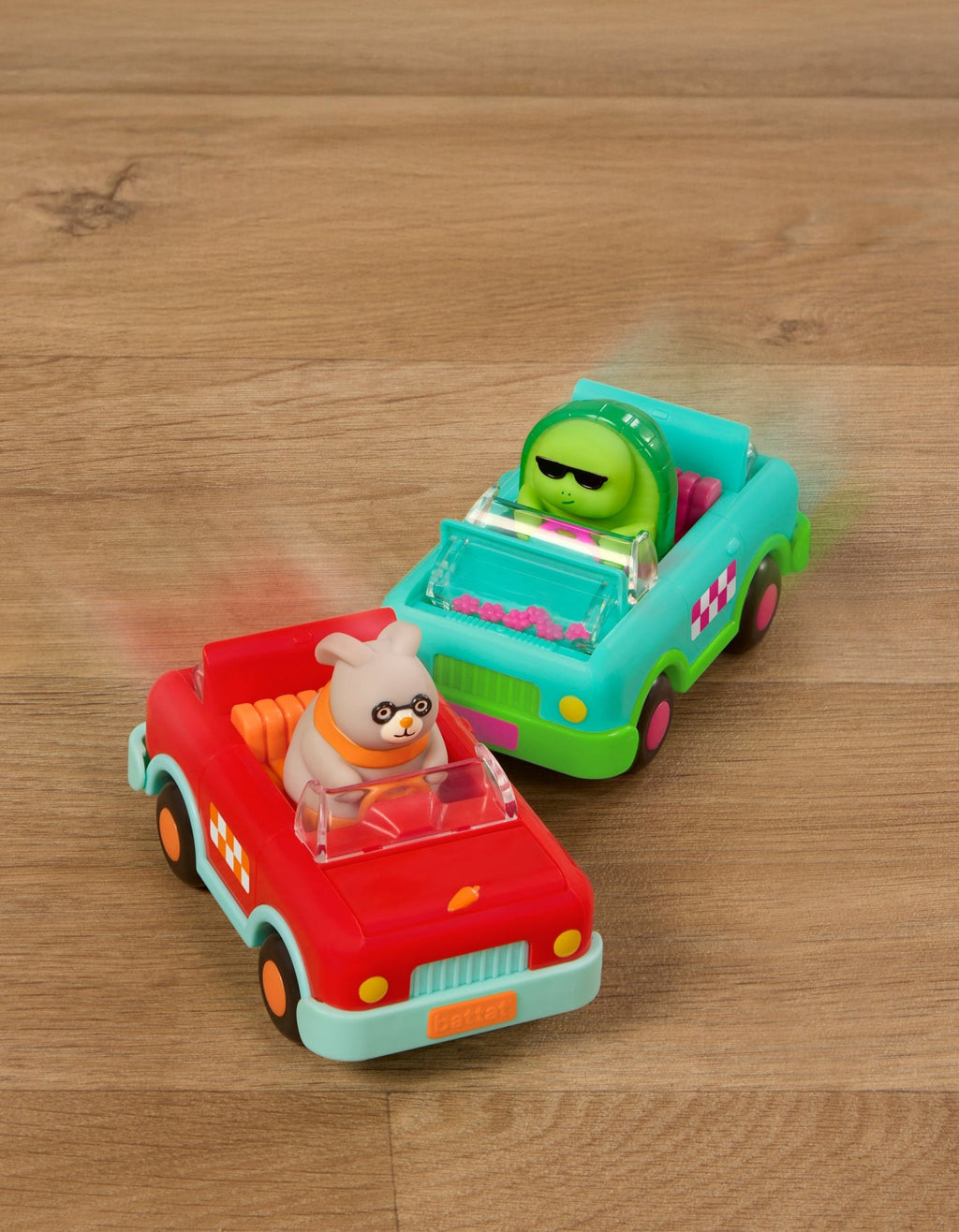 Red and turquoise critter cruisers with figures inside