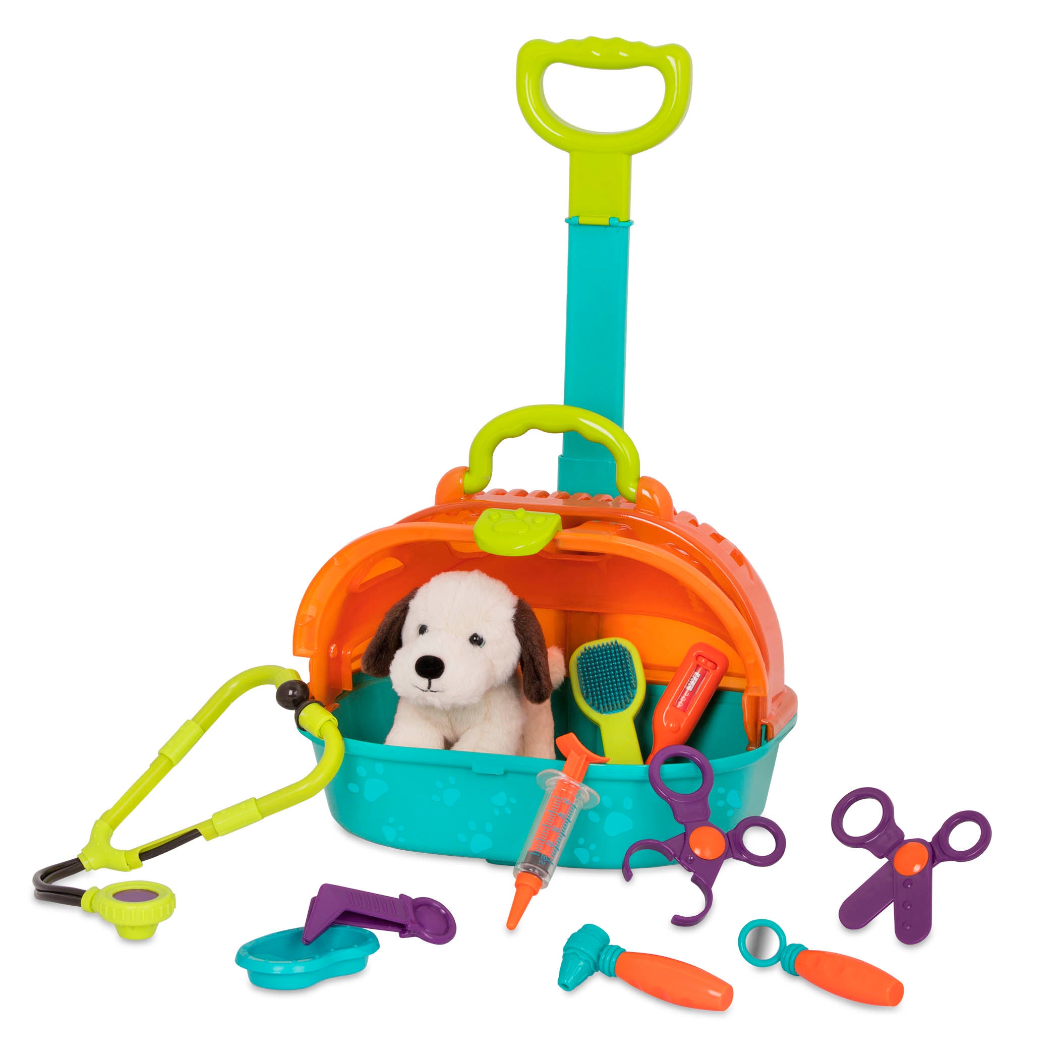 A toy pet carrier with a plush puppy inside and vet tools surrounding it.
