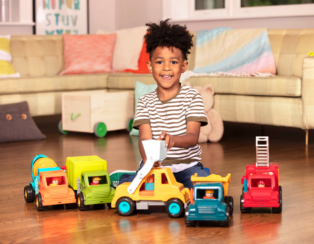 A front end loader toy with the shovel lifted.