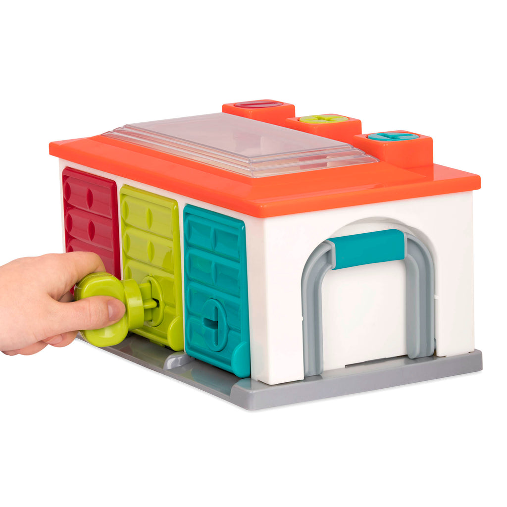 Toy garage and toy cars.