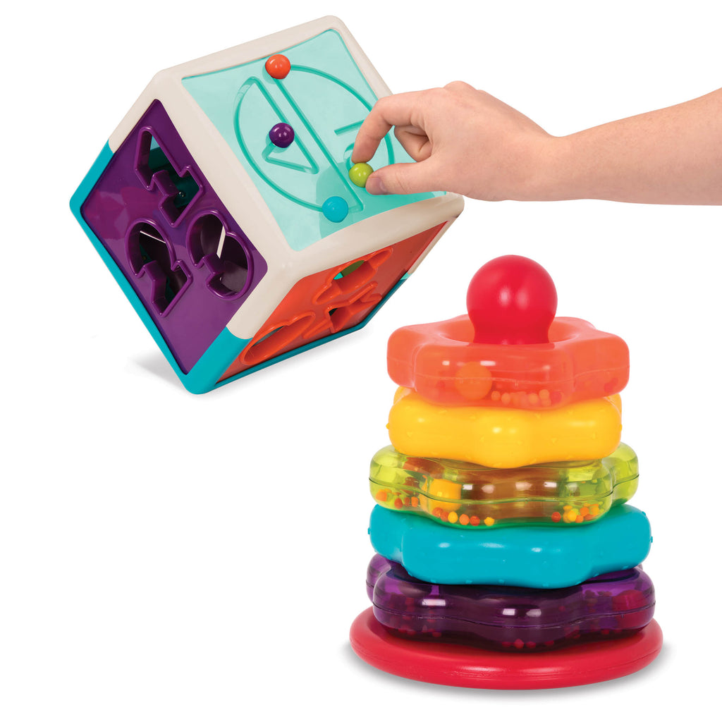 Shape sorter cube and stacking rings for toddlers.