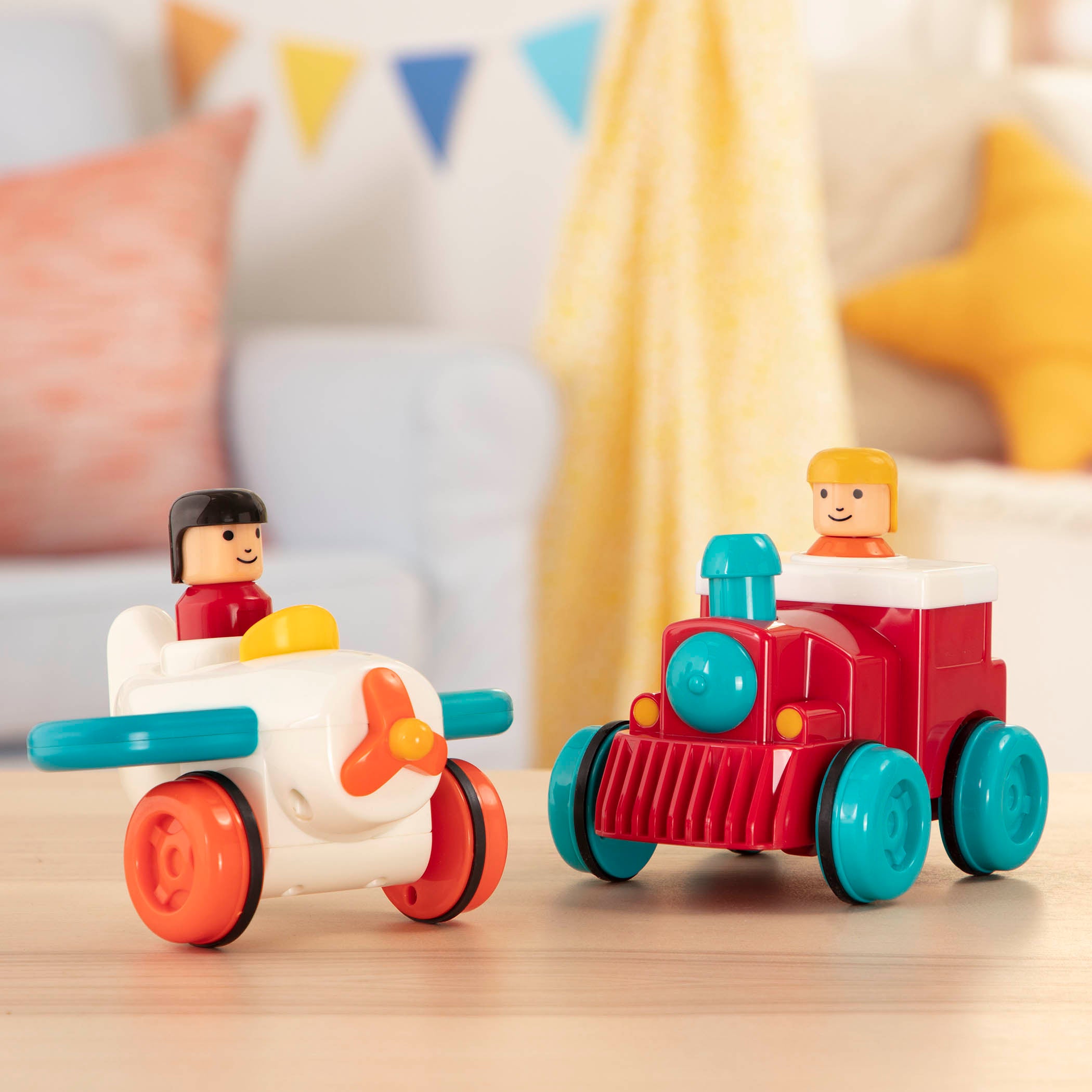 Pump and go toy plane and train with drivers.