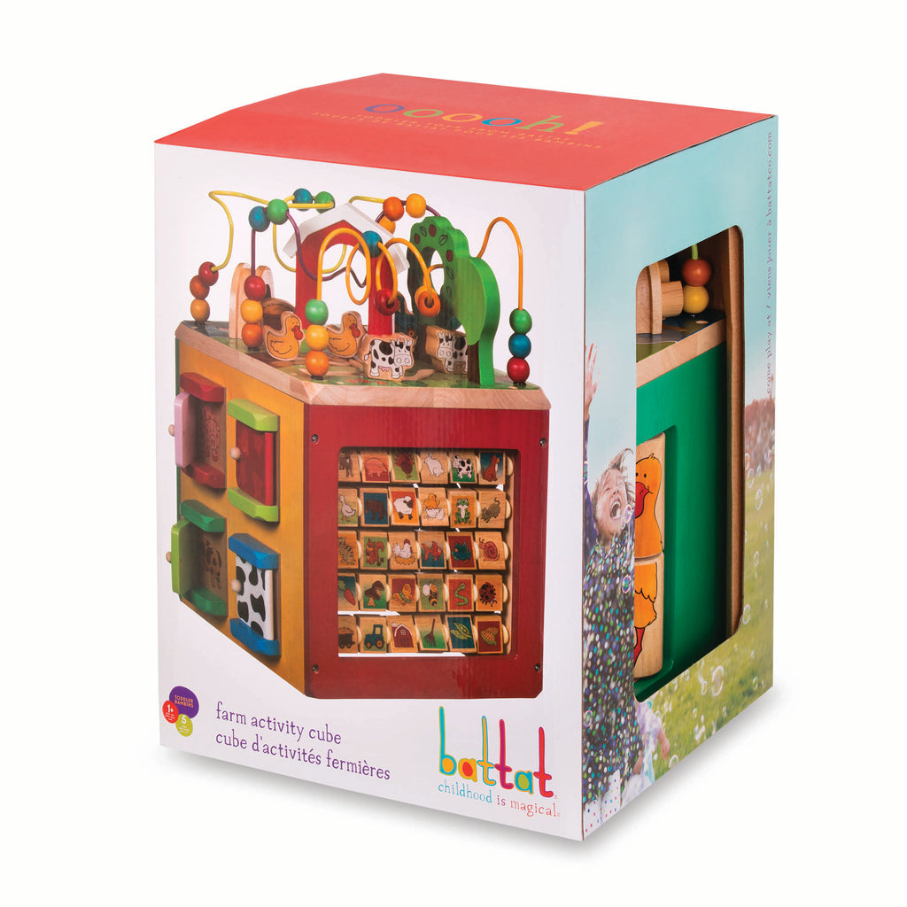 Farm animal activity center with a bead maze on top.