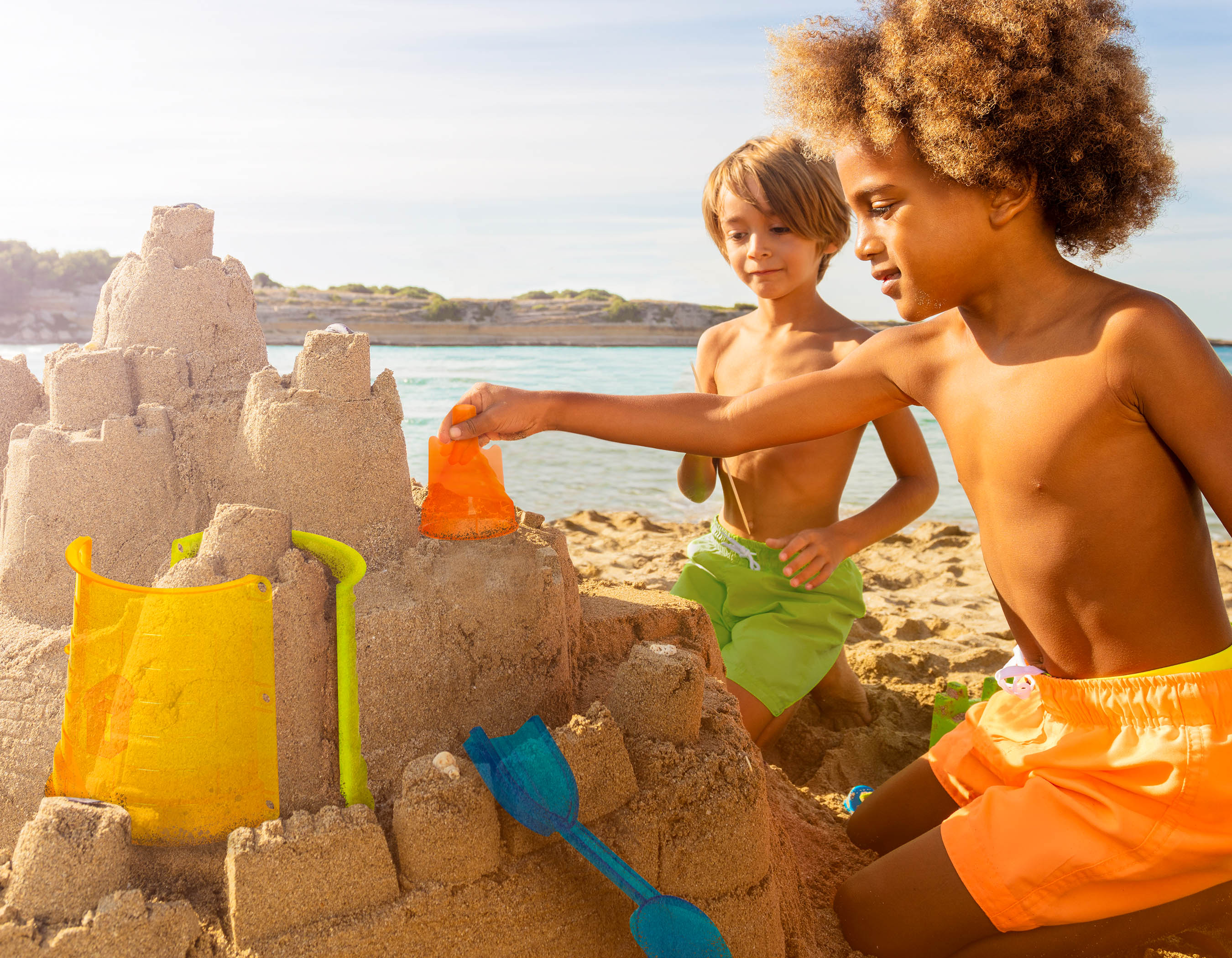 Colorful sand castle building toys.