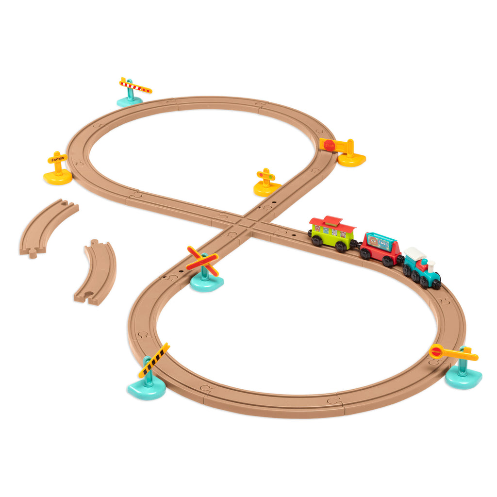 Toy train set with tracks and colorful trains and accessories