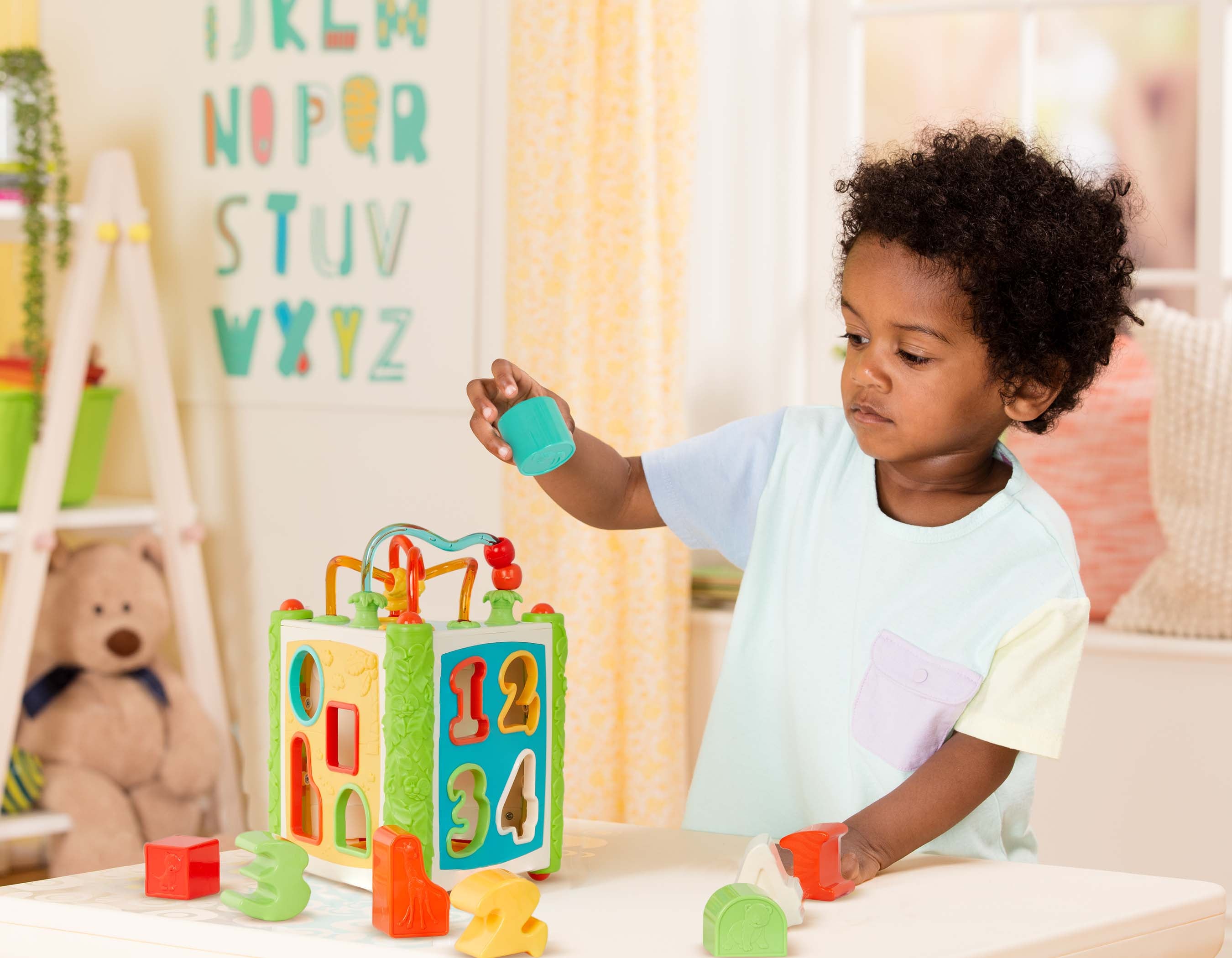 Jungle-themed activity center with number and animal shapes.
