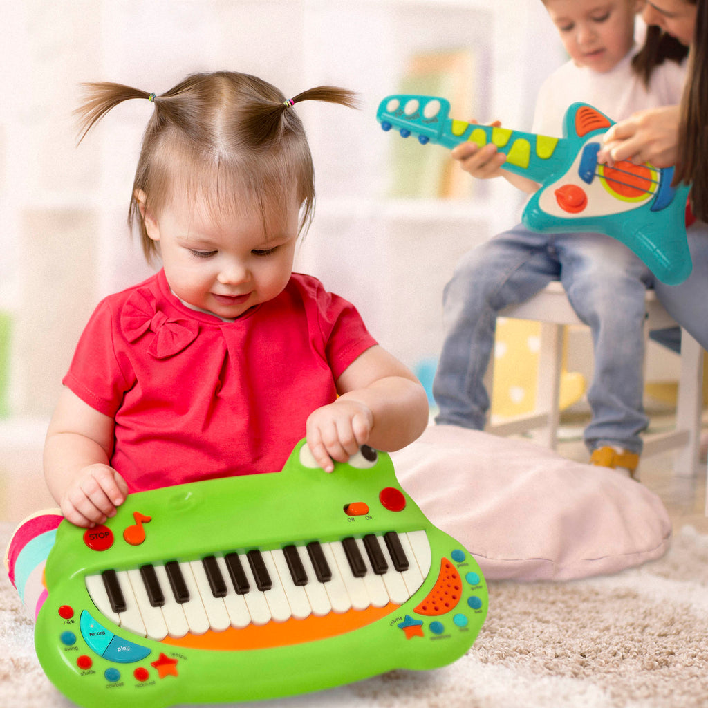 Toy crocodile piano for kids with piano keys making up a big crocodile grin!