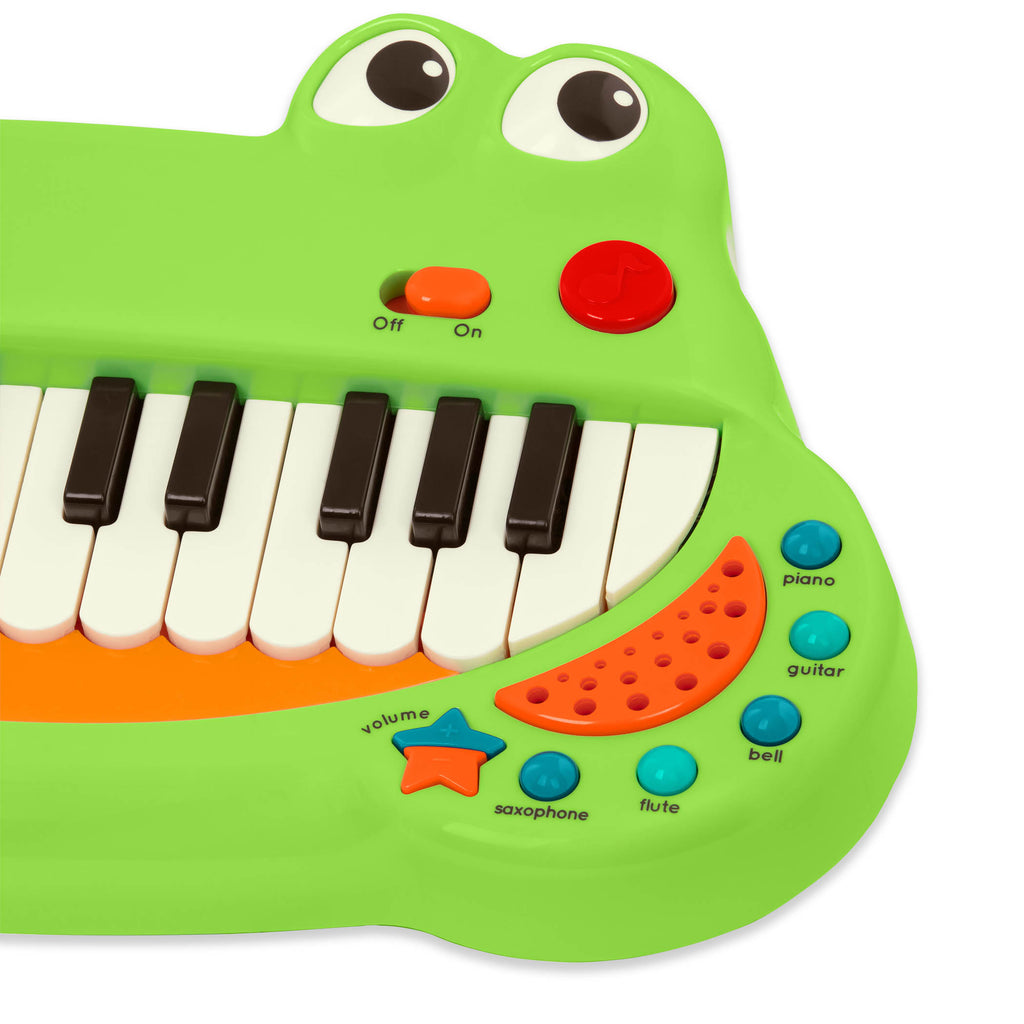 Toy crocodile piano for kids with piano keys making up a big crocodile grin!