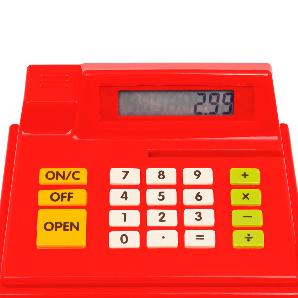 Toy cash register with drawer open and accessories surrounding it.