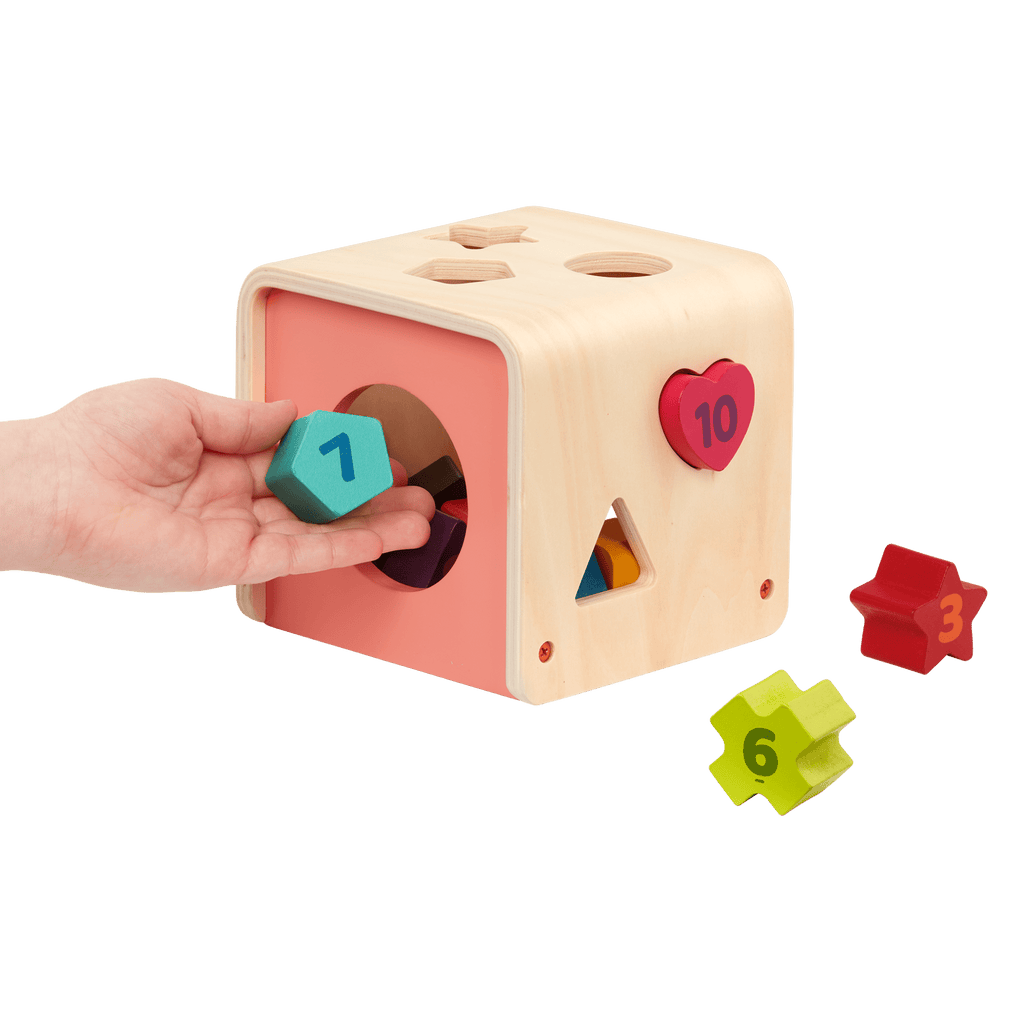Wooden shape sorting toy.