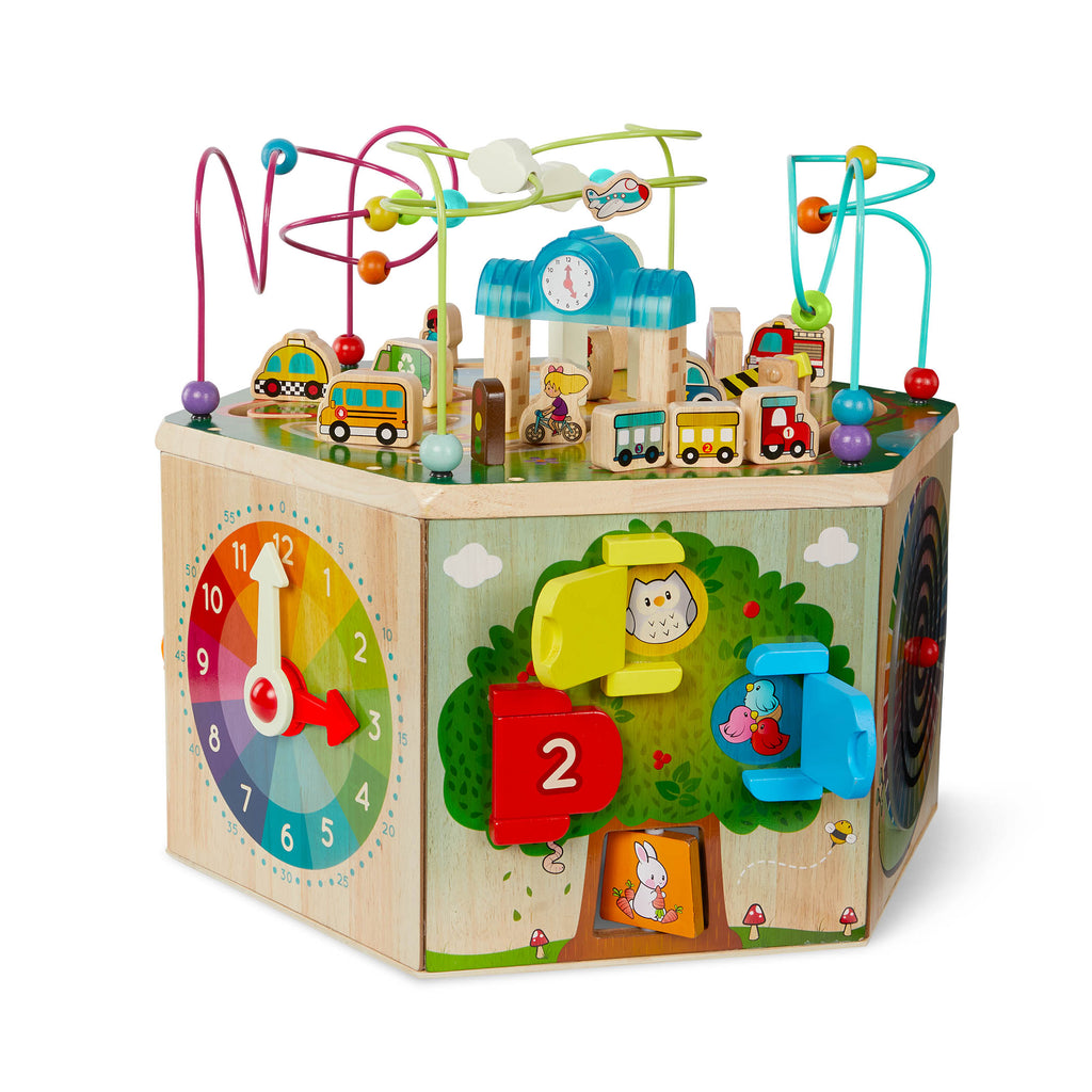 A 7-sided activity cube with a colorful pretend clock.