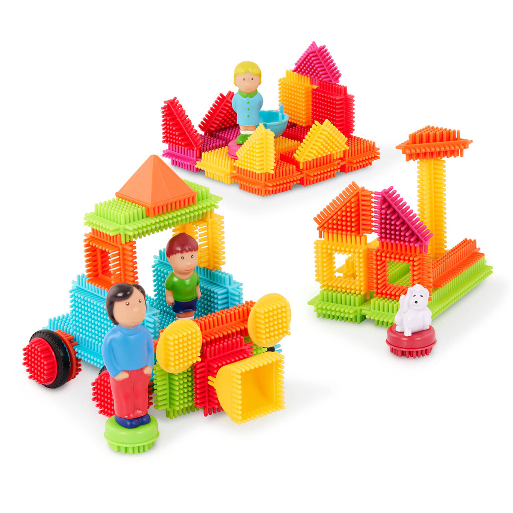 Bristle Blocks laid out to show all the pieces.