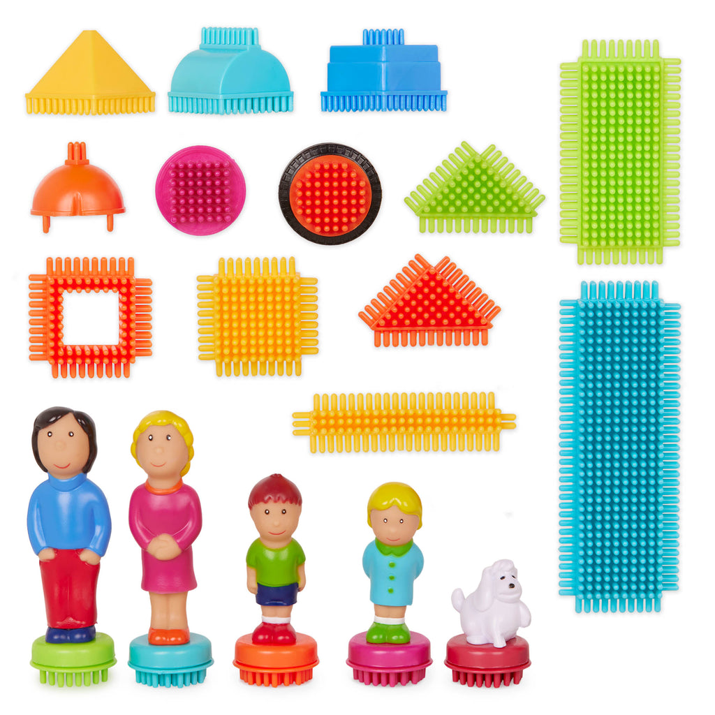 Bristle Blocks laid out to show all the pieces.