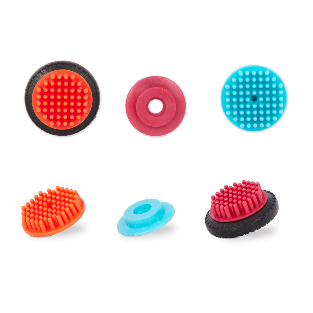 Creations made with Bristle Blocks, including a car with functional wheels.