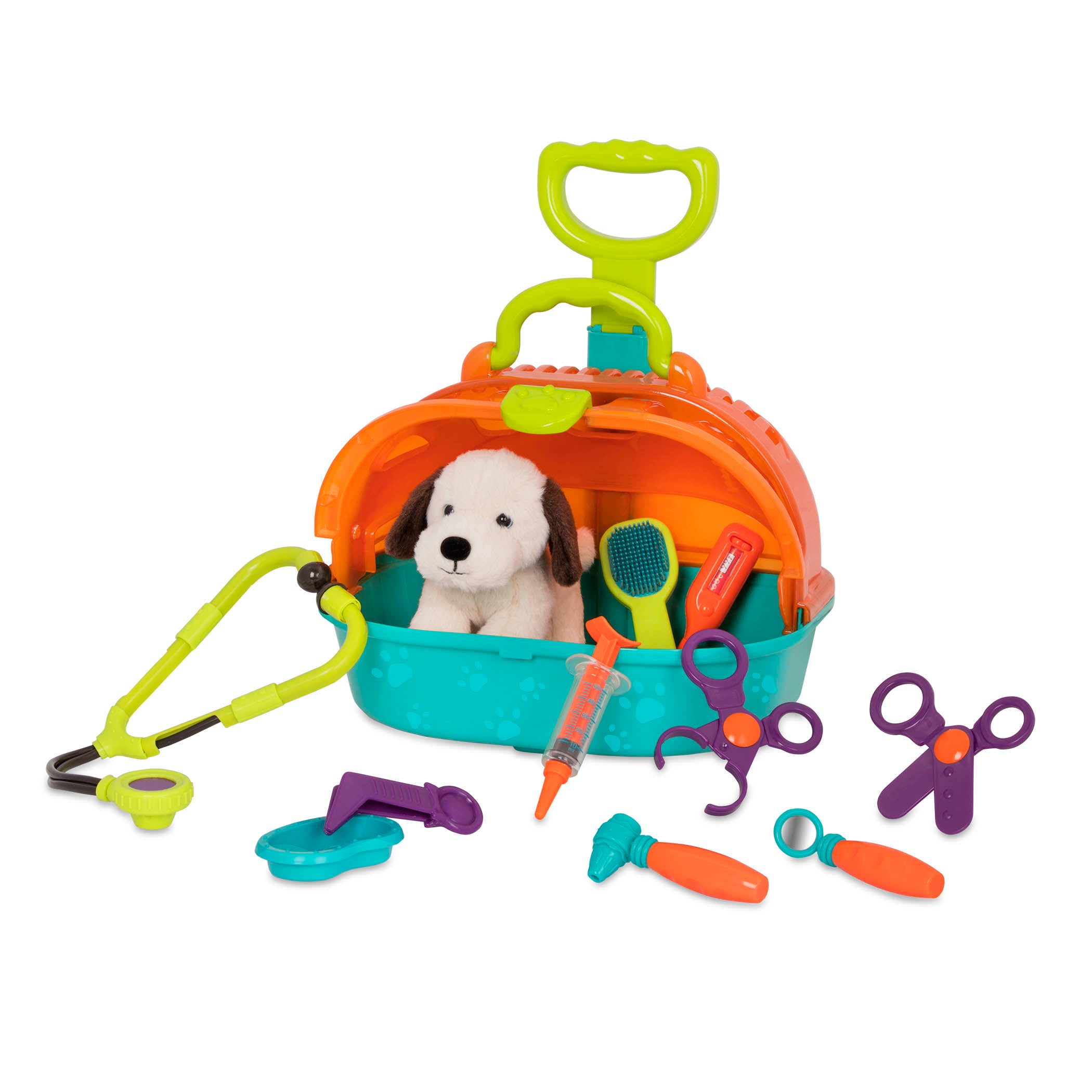 A toy pet carrier with a plush puppy inside and vet tools surrounding it.