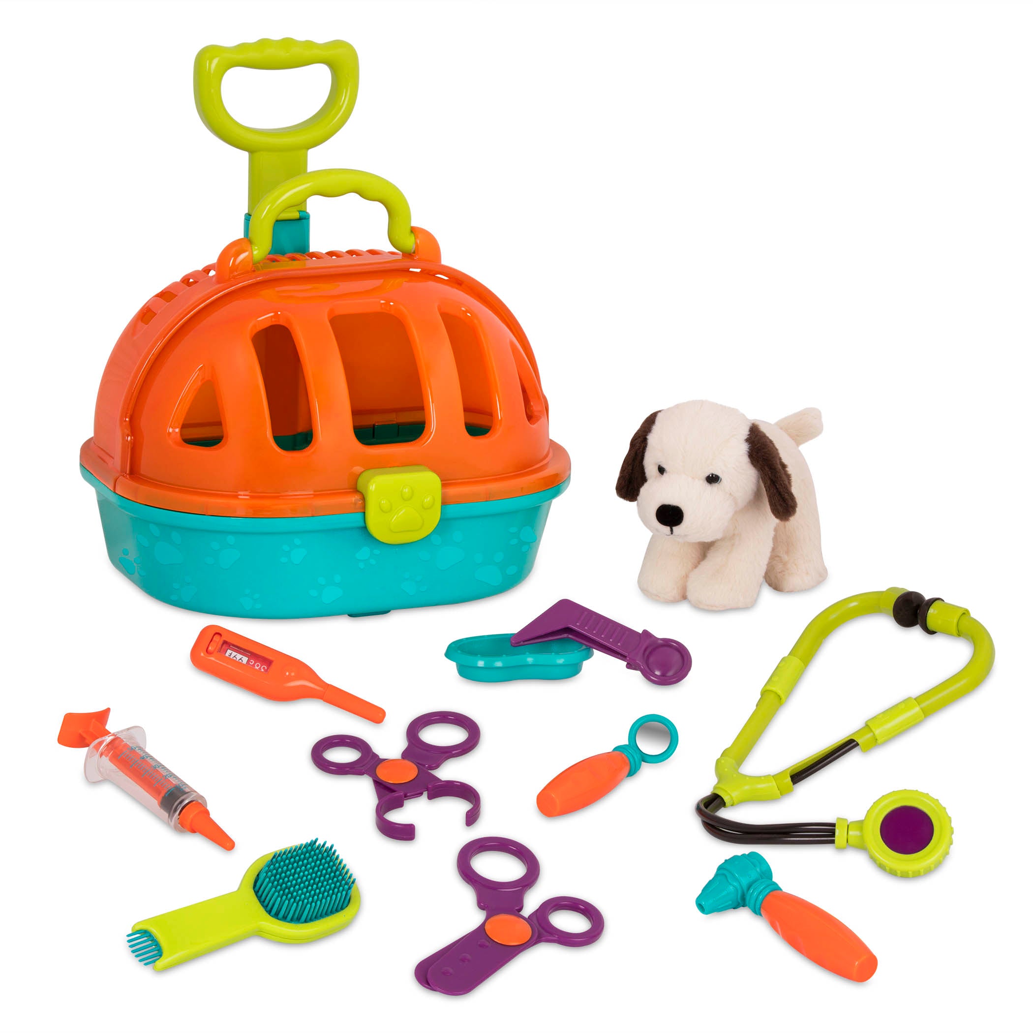A toy pet carrier with a plush puppy inside and vet tools surrounding it.