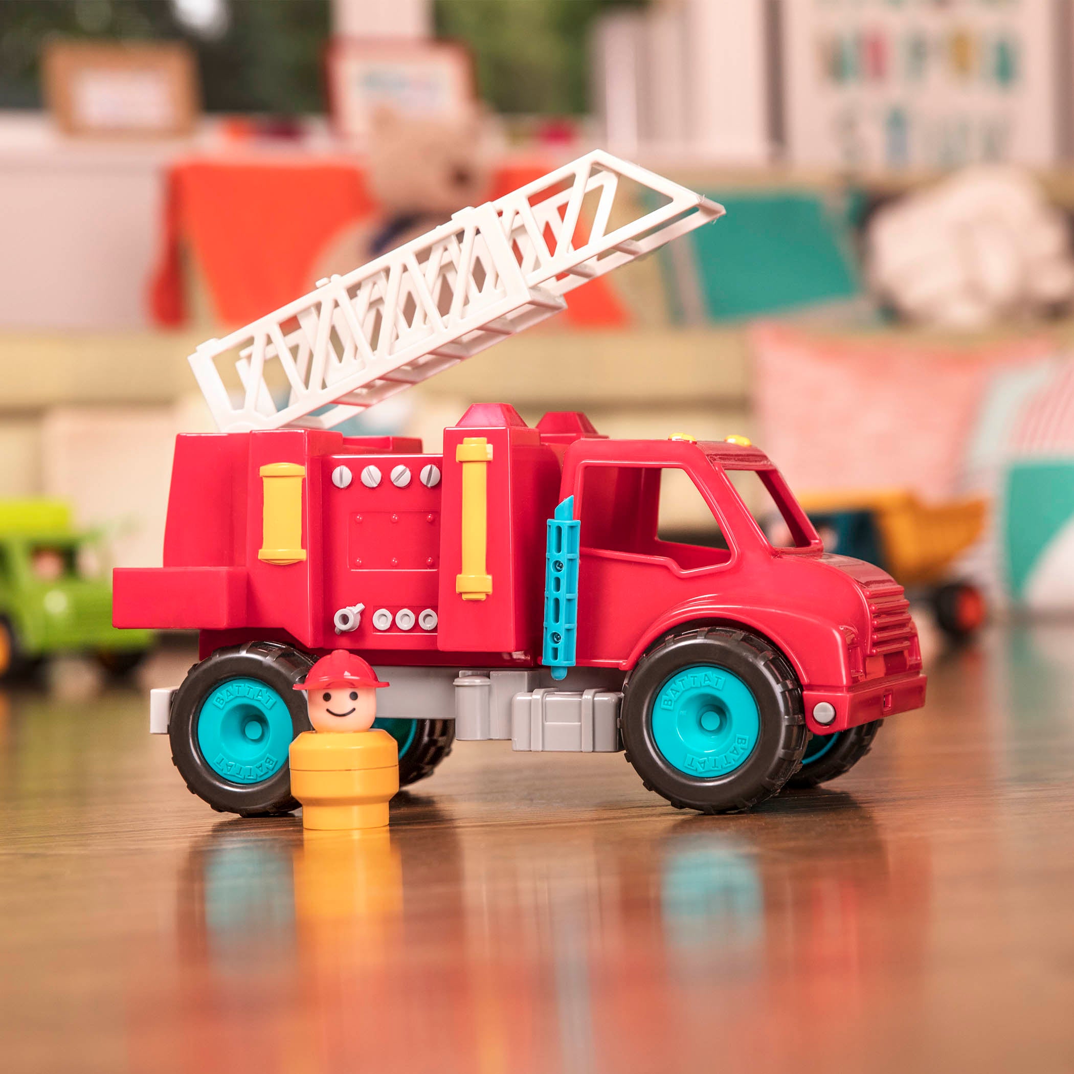 A red toy fire truck.