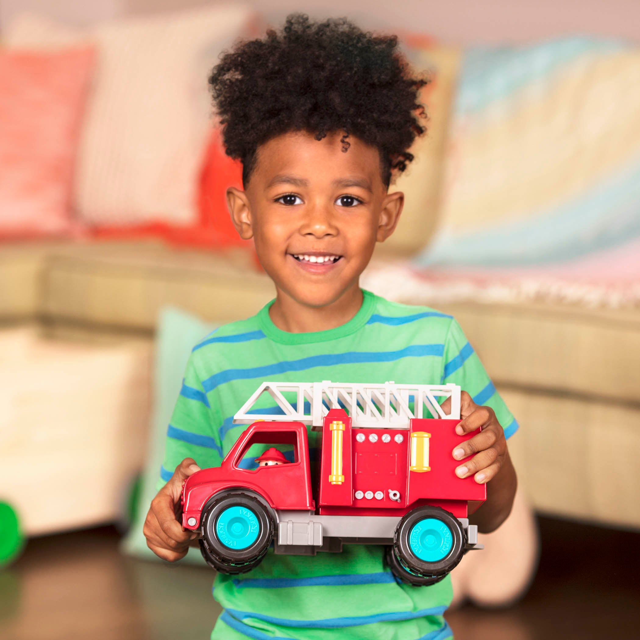 A red toy fire truck.