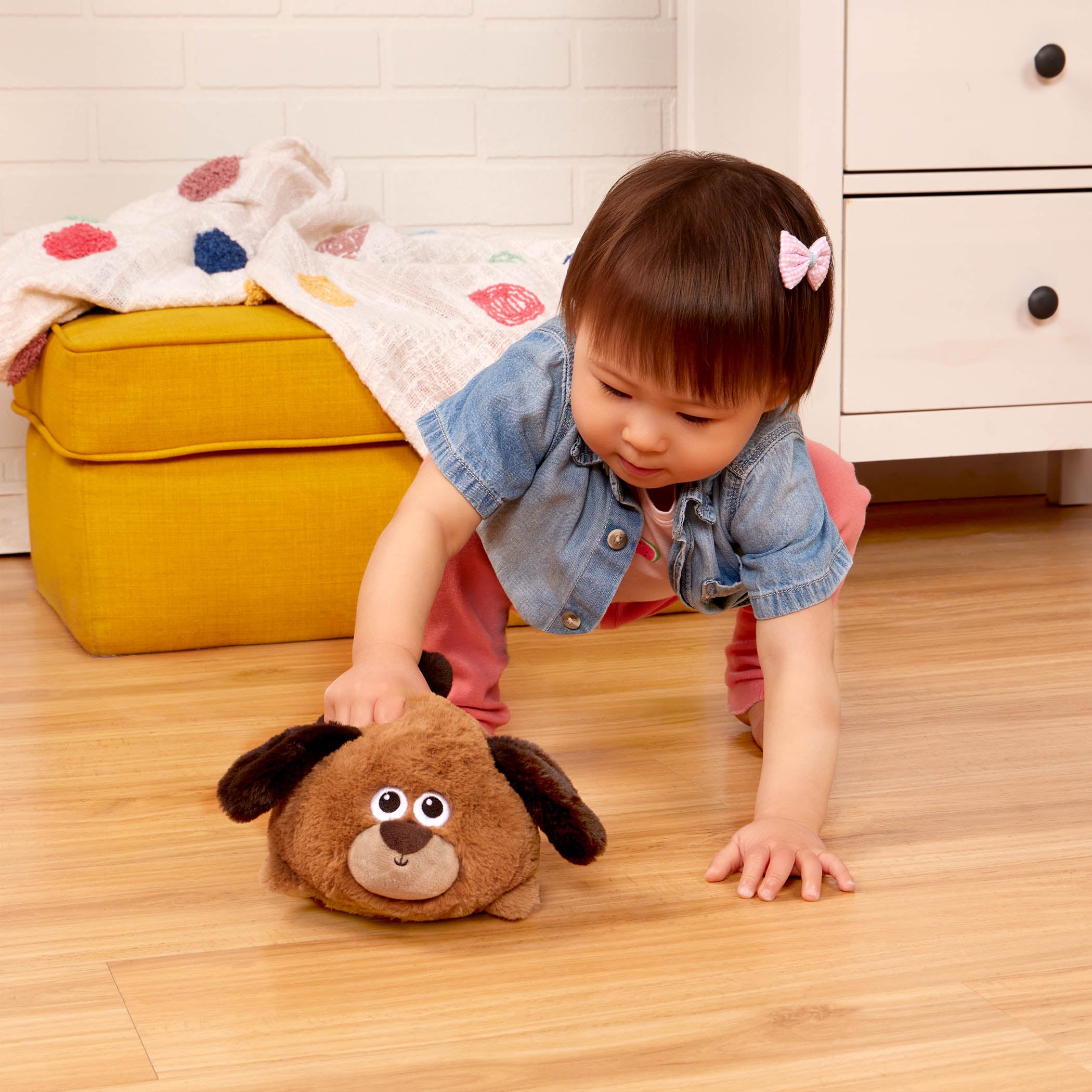 A spotted plush puppy toy for toddlers and kids.