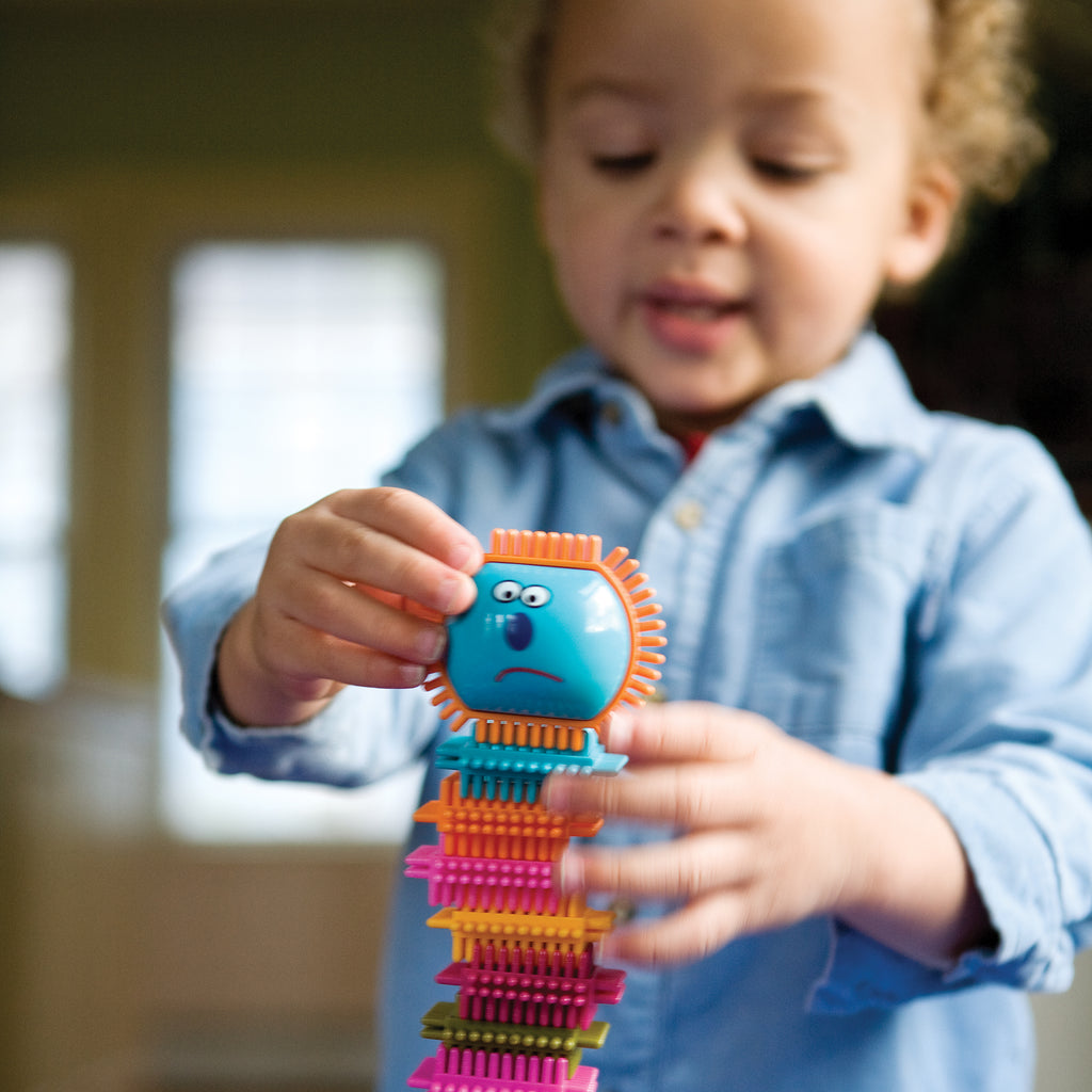 Interlocking bristle building blocks.