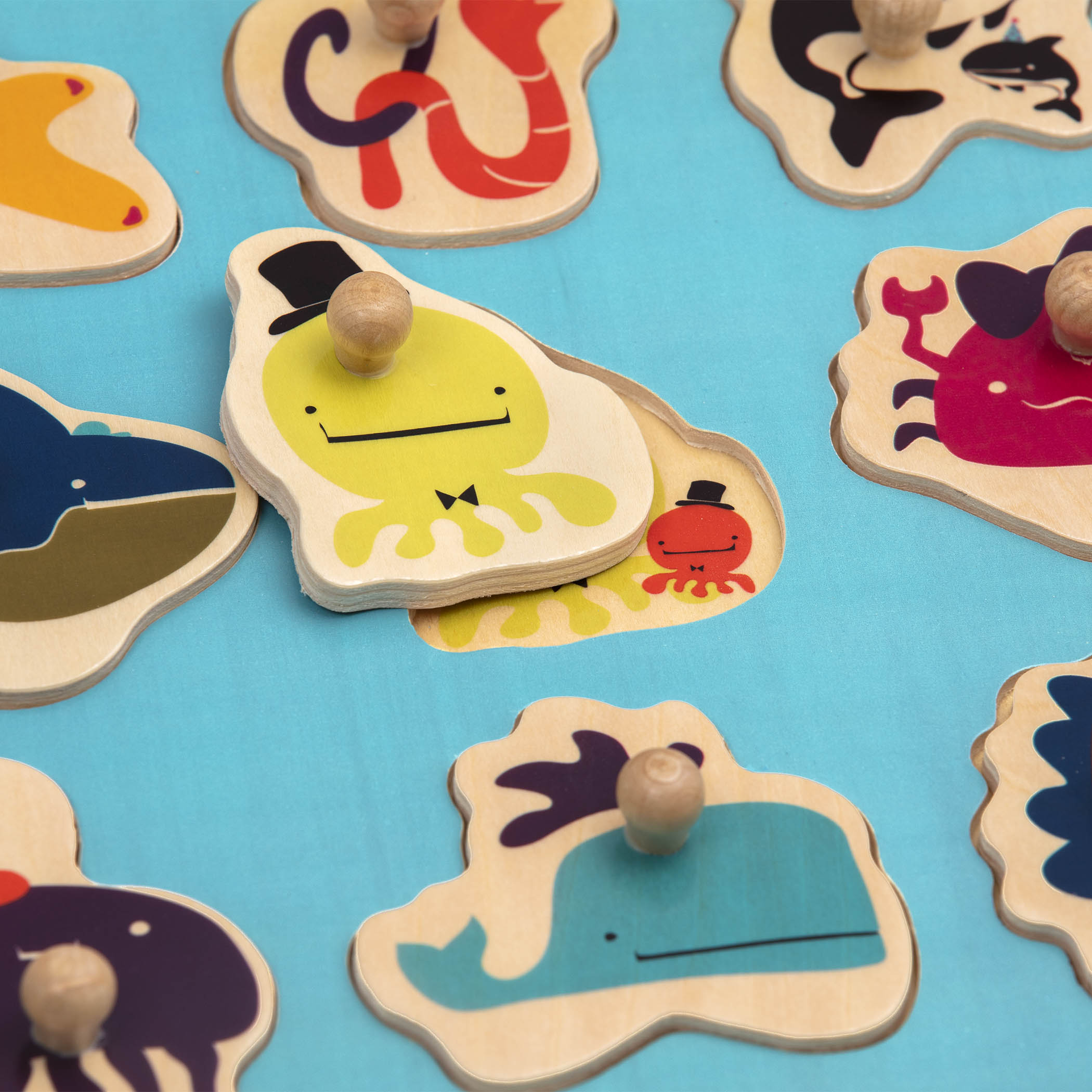 Ocean-themed wooden peg puzzle