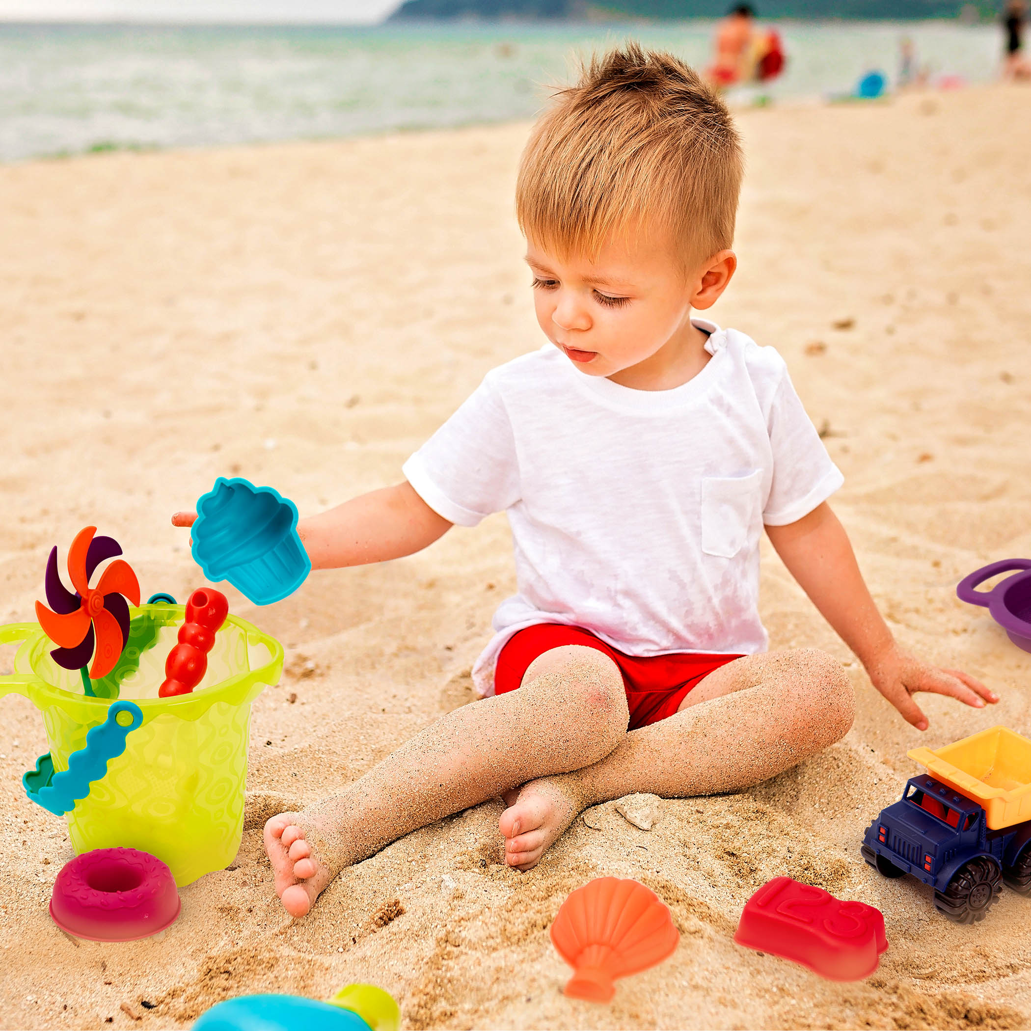 Beach toys with lime bucket.