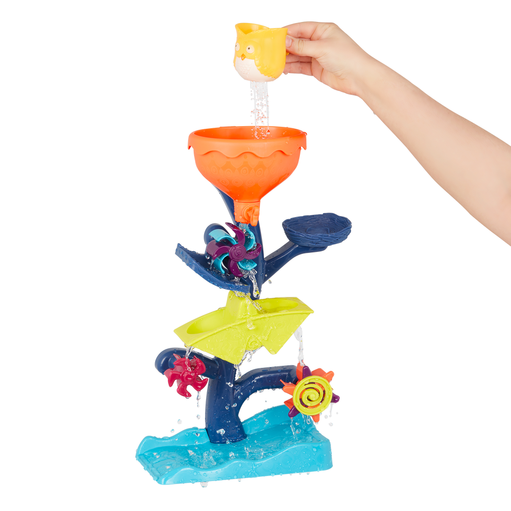 Water wheel toy with owl and truck.