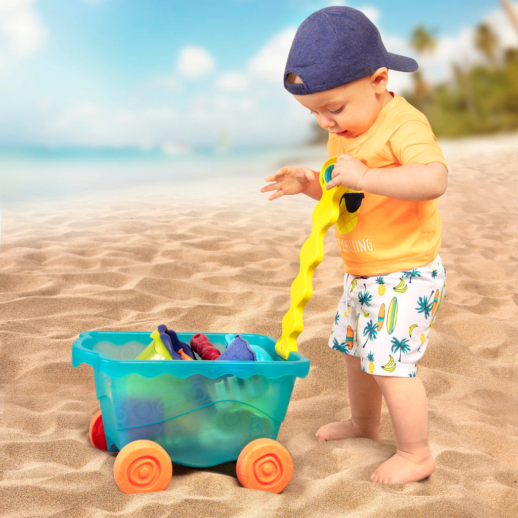 Beach toys and translucent blue wagon