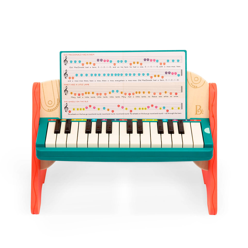 Wooden toy piano with songbook.